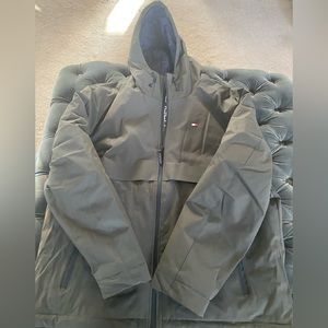 Men’s Tommy Hilfiger Hooded Puffer Jacket.  Olive with blue inside the hood